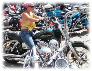 biker chick cruising through sturgis