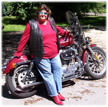 september picture of janet and bike