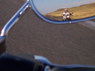 biker reflected in mirror